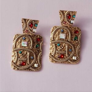 Elegant Gold-Toned Pendant with Multicolor Accents